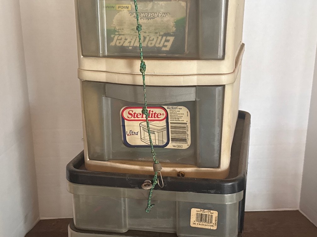 Storage Bins With Tools, Rechargeable Batteries, Vice Grip Tape Measure
