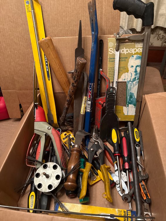 Box Full of Saws, Hammers, Screwdrivers, and More