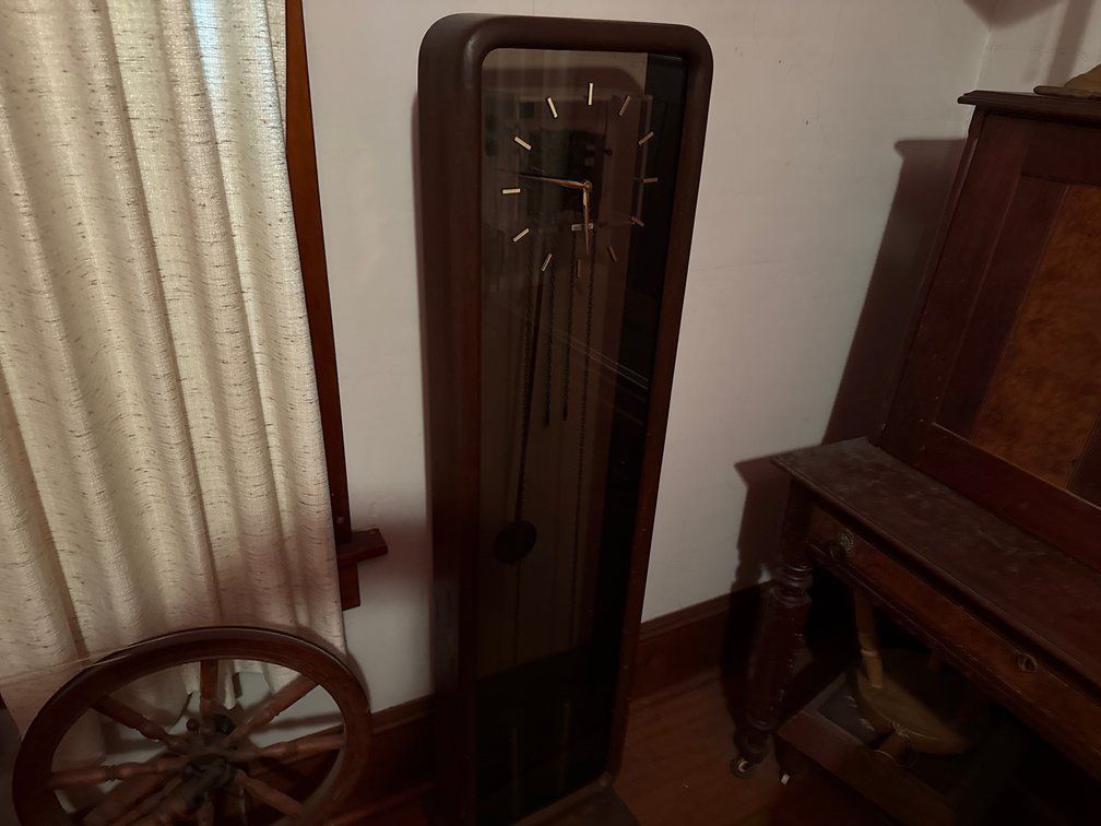 56.5”x14”x4” Howard Miller Grandfather Clock