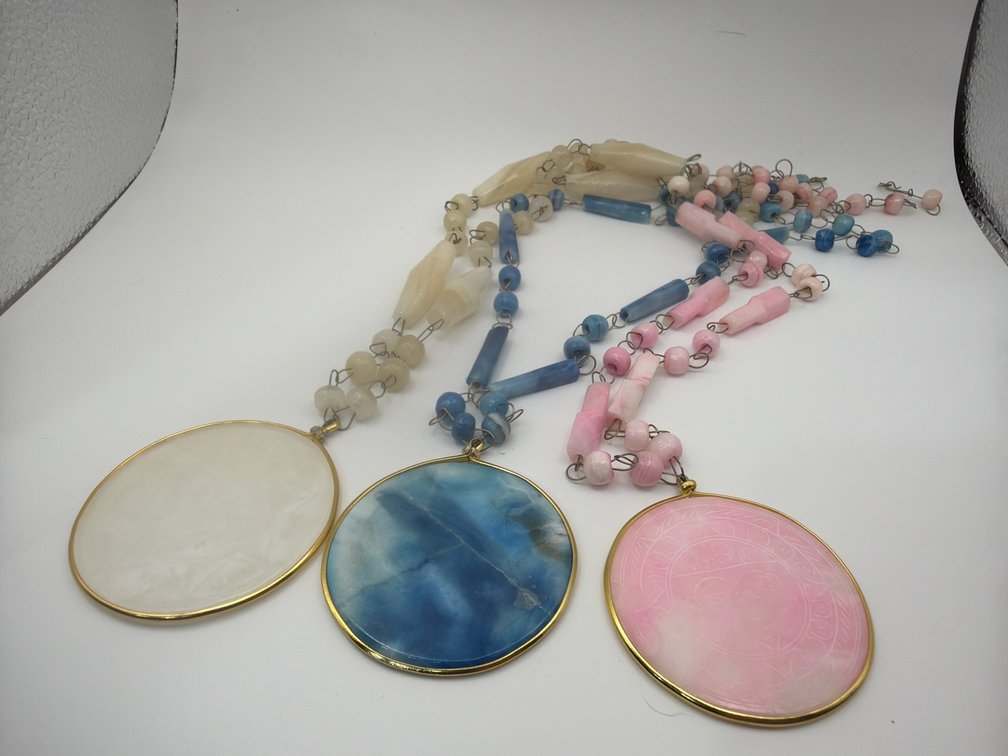 Beaded Necklaces Featuring a Shell Pendant