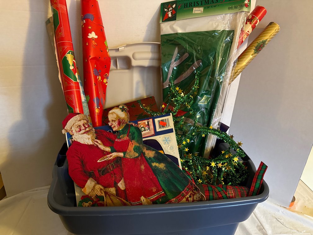 Tote Of Holiday Decoraction, Bows, Wrapping Paper, and More