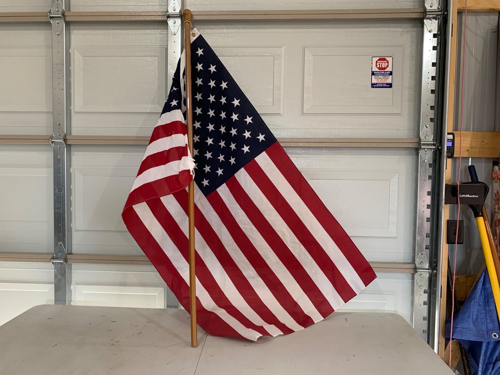 American Flag on Wood Pole