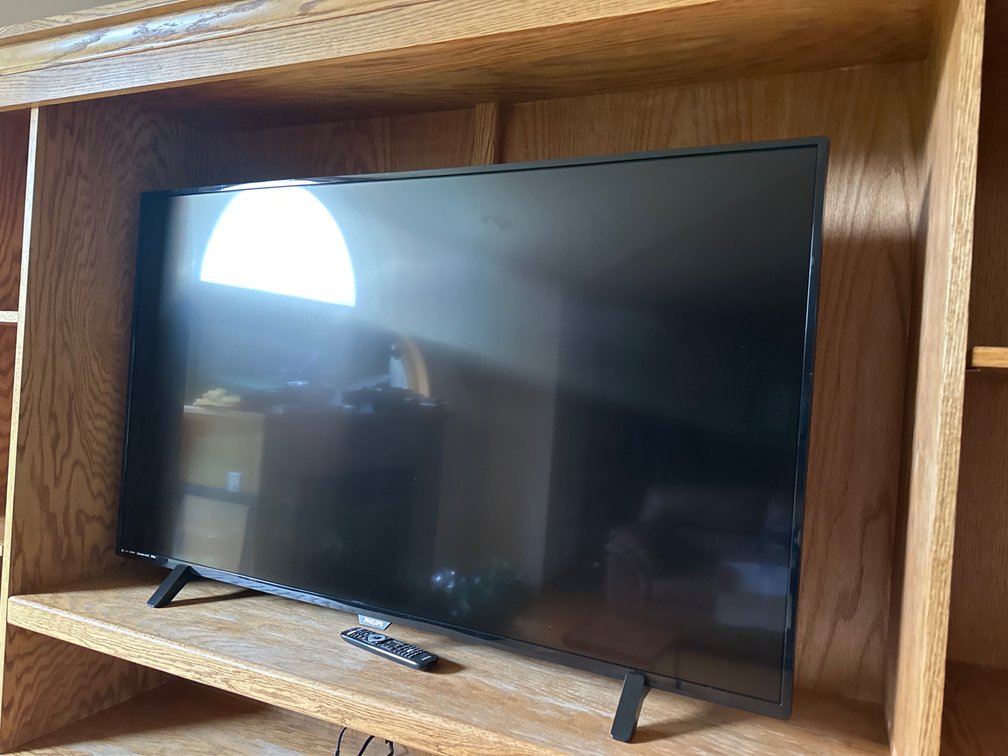 54” Phillips Flat Screen with Remote