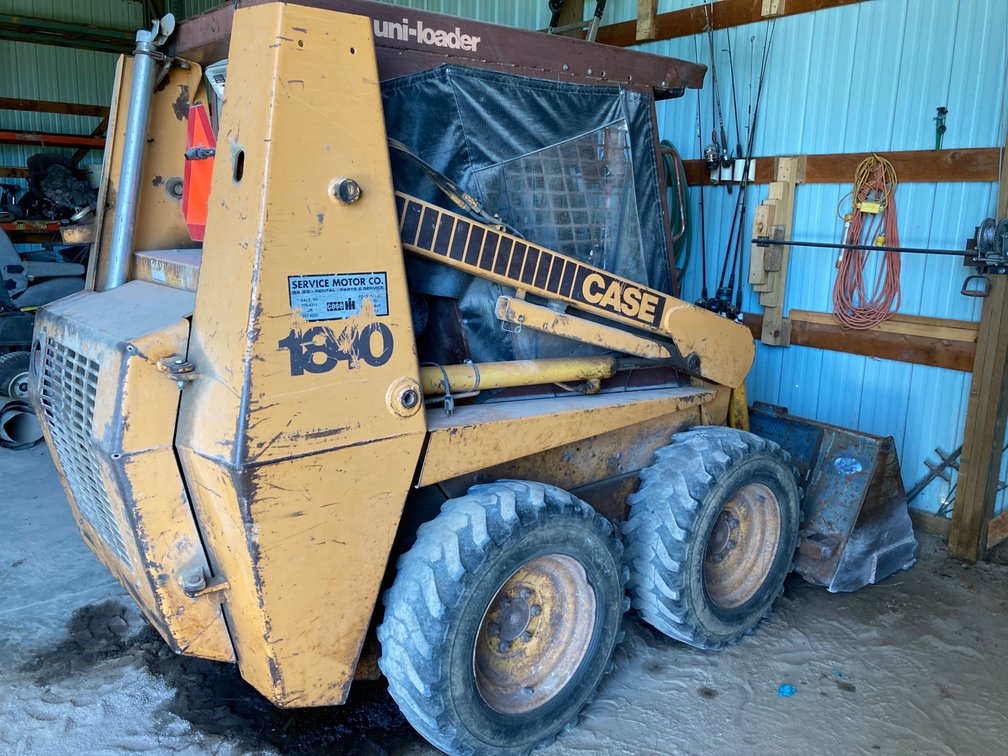 Model 1840 (1977) Case Skid Steer and Several Attachments