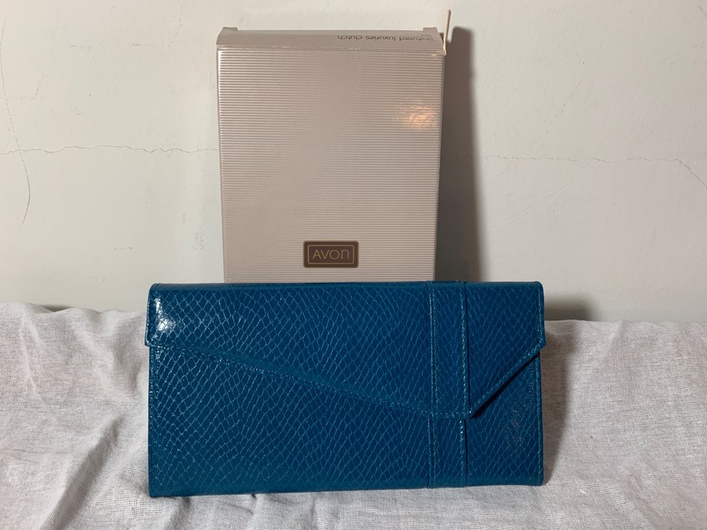 Avon New Textured Teal Clutch