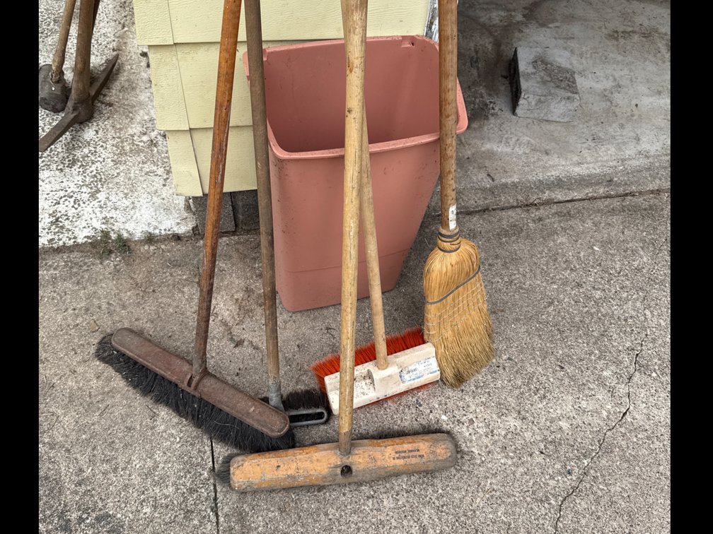 Garbage Can with Brooms