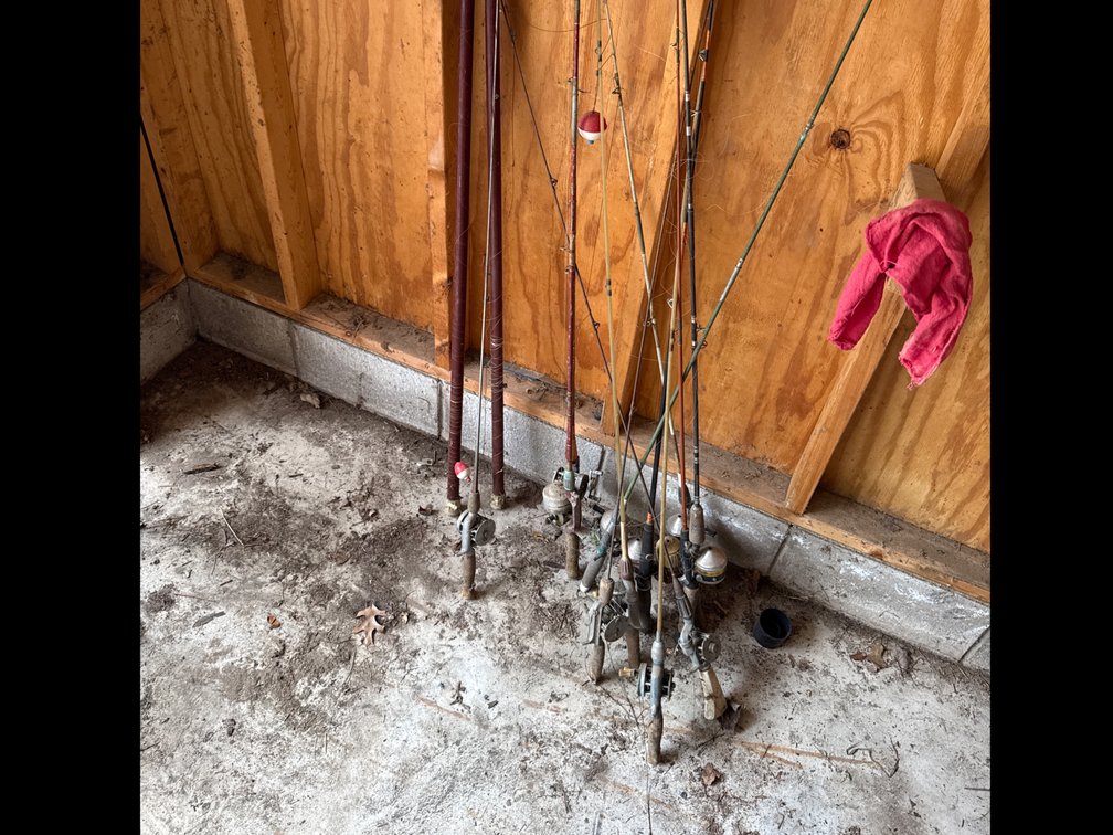 Variety of Old Fishing Poles, Reels