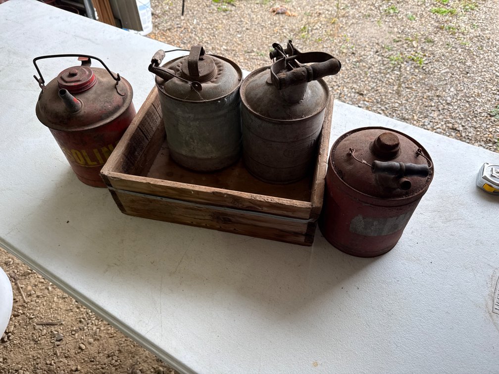Wood Crate with Old Gasoline Cans