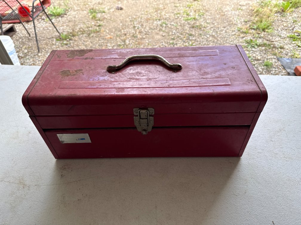 Red Metal Toolbox with Chains
