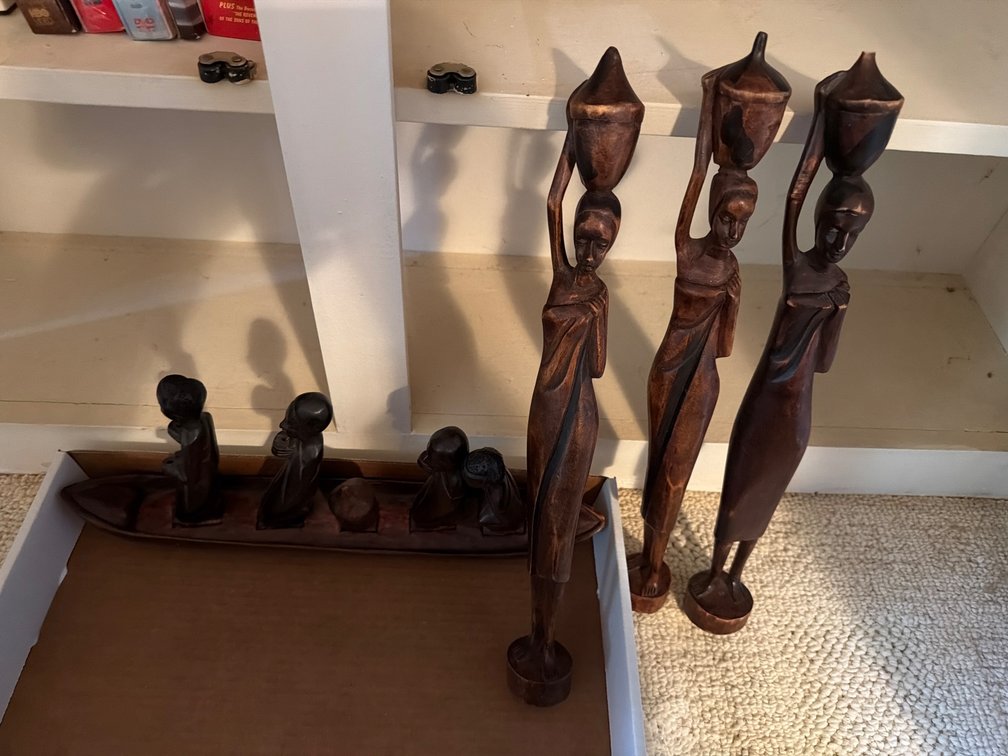 Wood Carved Decorative Pieces-Figures in a Boat, Figure Carrying Pot