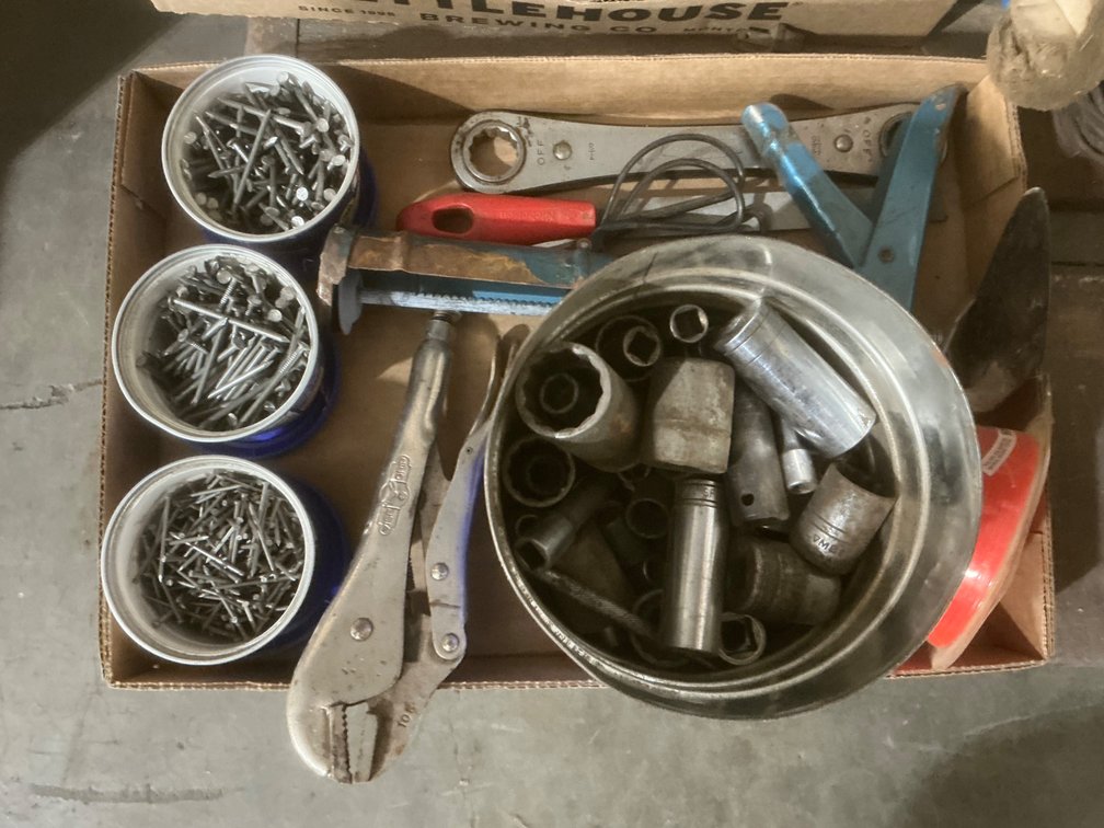 (3) Containers of Assorted Nails, Coffee Can of Assorted Sockets (About 2/3 Full), Vise Grips, Trimmer Line, Caulk Gun, Metal File, Craftsman Wrench and Other Miscellaneous