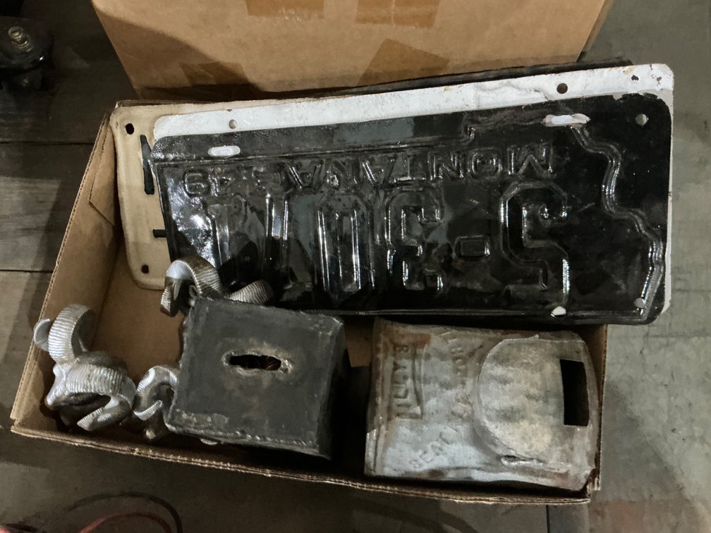 (3) Dodge Ram Head Hood Ornaments, Vintage Can, Custom Welded Coin Bank and (4) Vintage License Plates