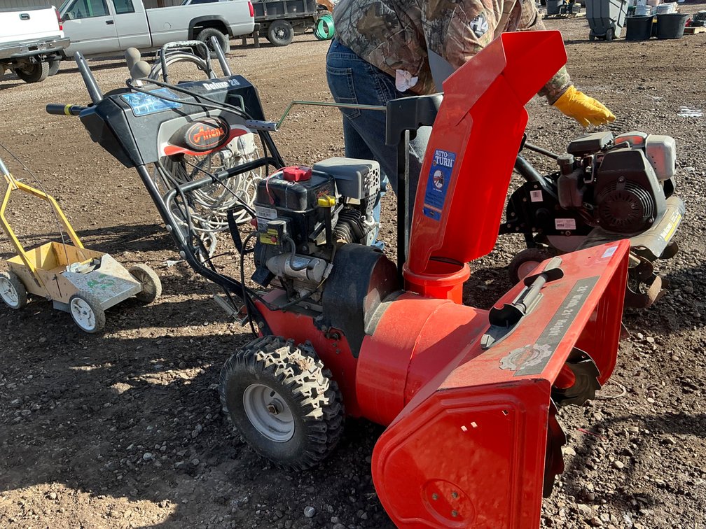 Ariens Deluxe 28 Snow Blower - Model: 921030, Walk Behind, 28" Cut Path, 21"H, Auto Turn Steering Technology, Ariens AX 254cc Engine, 12.5 Gross Torque, In Dash Headlight, Serial: 006184