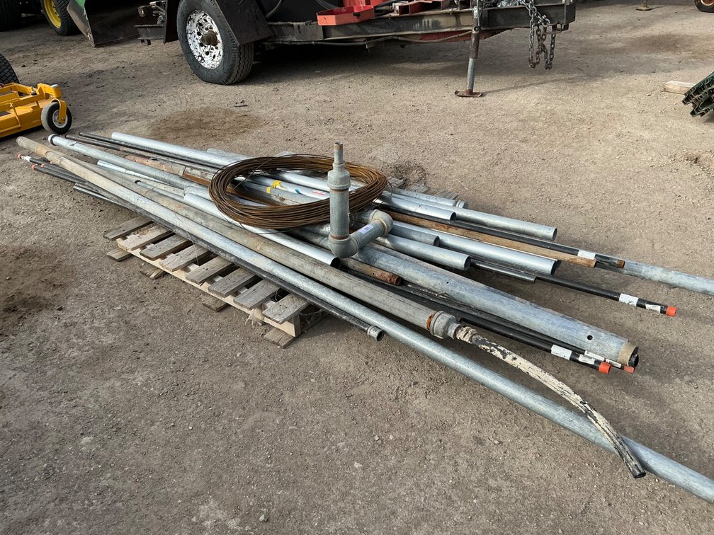 Pallet: Assorted Galvanized and Black Iron Pipe Sections and Coil Of Wire