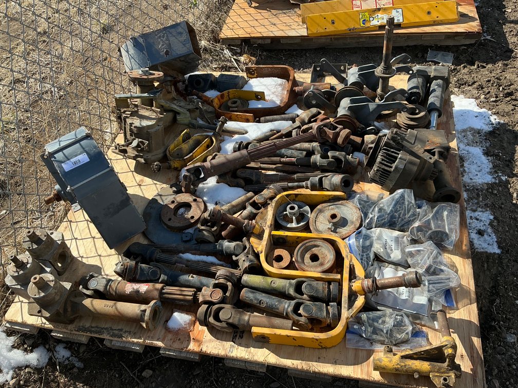 Pallet of Walker Mower Parts - Wheel Forks, Pulleys, Blowers, Gear Box Parts, PTO Shafts and More