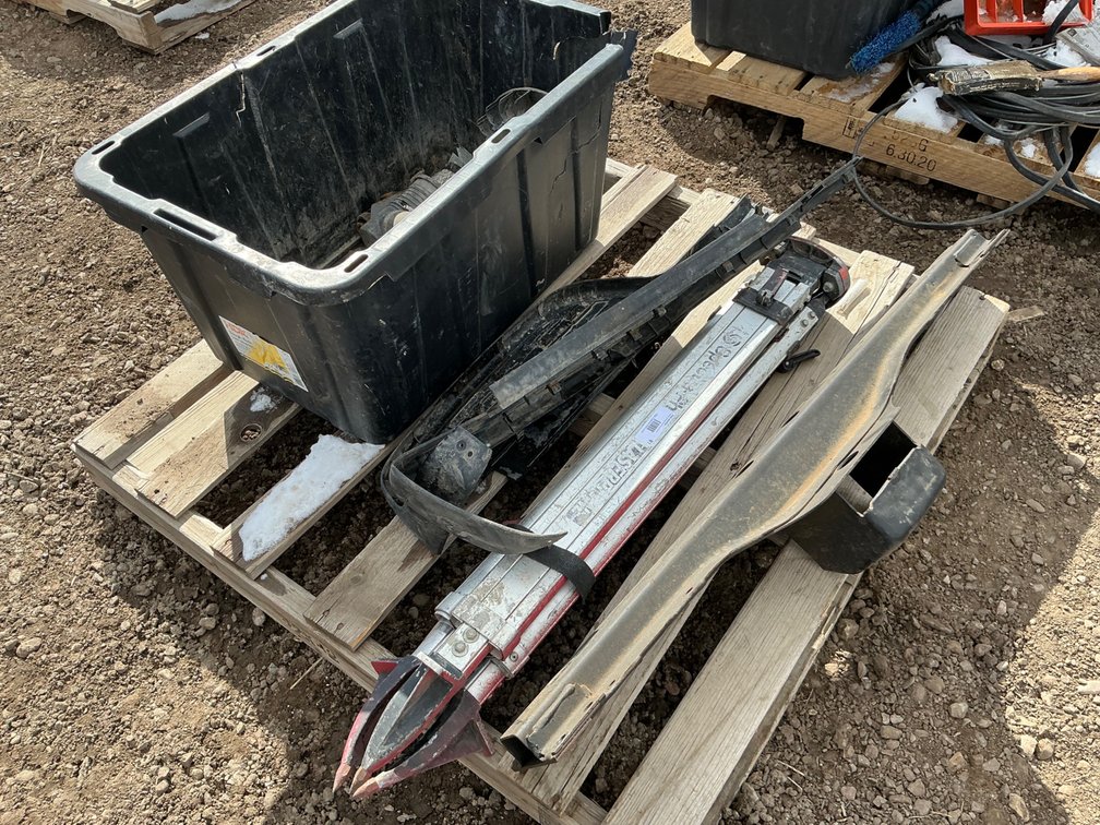 Pallet: Surveying Tripod, Frame Cross Member, GM 99'-07' Rear Bumper Caps and Tote of Miscellaneous Items