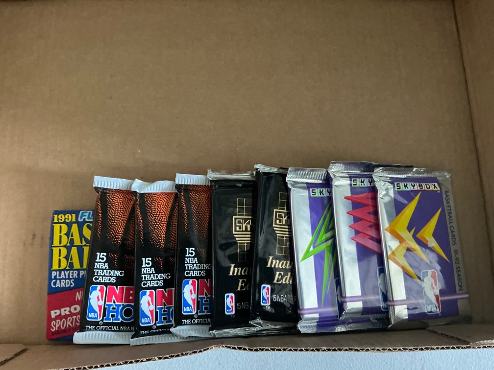 Unopened Basketball Card Packs - (3) Skybox 1991-1992, (2) Skybox 1990, (3) Series 1 NBA 1991-1992 and (1) Fleer 1991