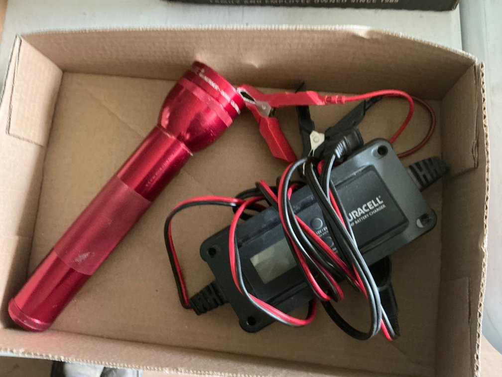 Duracell 4Amp Battery Charger and Red Mag-Lite Flashlight