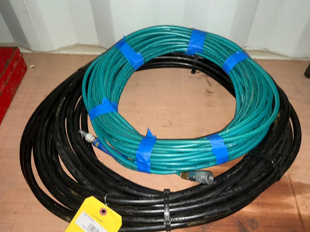 Black Extension Cord and Blue Amflo 1/4" Polyurethane Air Hose