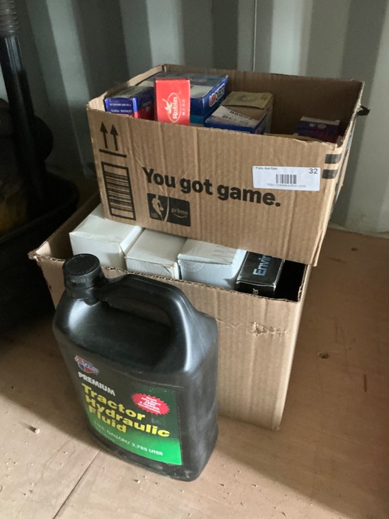 Box of Assorted Air & Oil Filters and One Gallon Jug of Carquest Premium Tractor Hydraulic Fluid