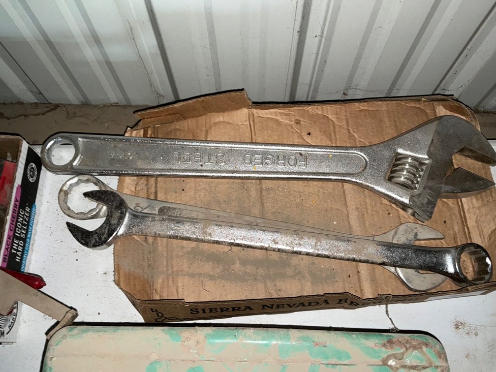 (1) Large Forged Steel Adjustable End Wrench, (1) 1-5/8" Wrench and (1) 1-7/16" Wrench