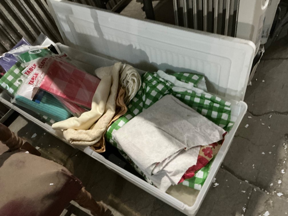 Tote Containing Assorted Tablecloths