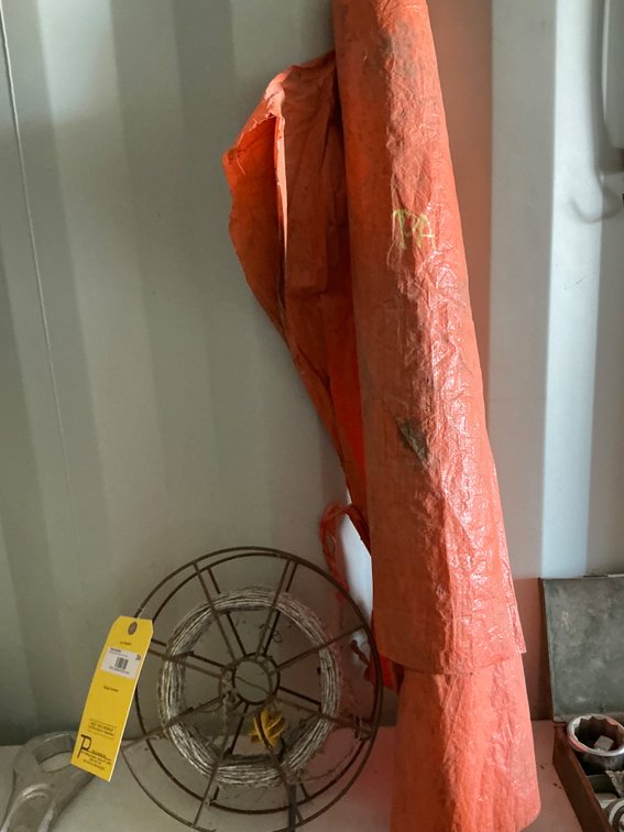 Partial Spool Of Poly Electric Fence Wire And Partial Roll Of Irrigation Ditch Liner