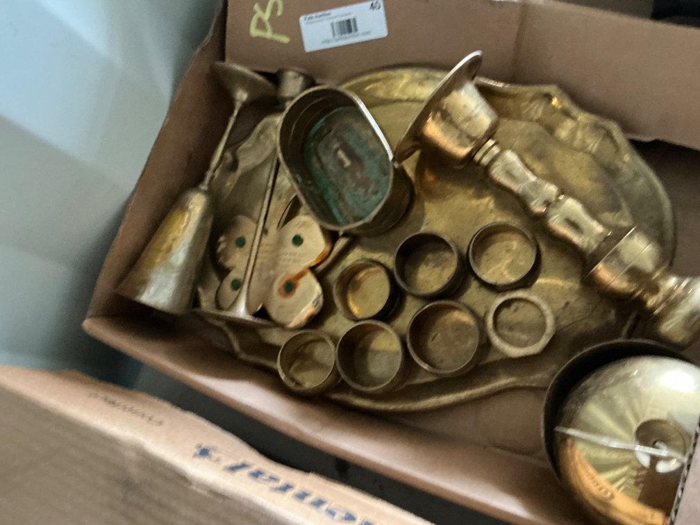 Box Of Assorted Brass Items - Candle Holders, Apple Figurine, Platter And Napkin Rings