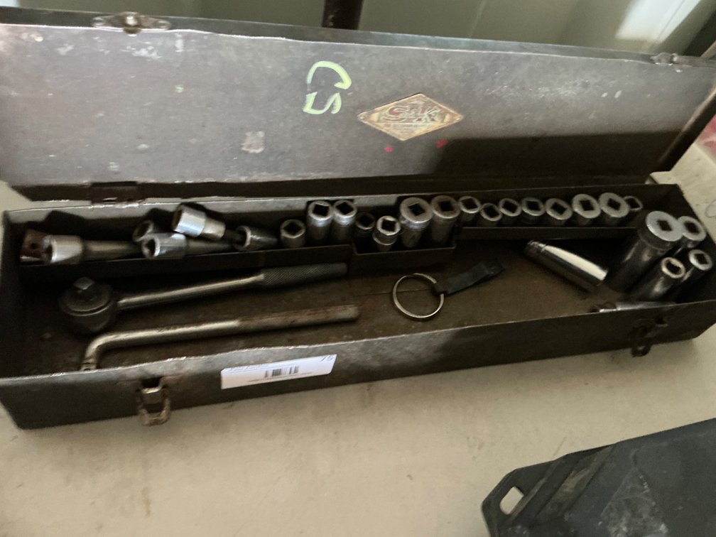 Metal Case Containing - 3/8" Drive Ratchet, Breaker Bar And Assorted Sockets