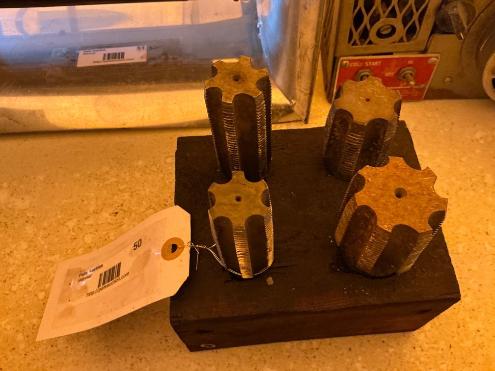 Wooden Block Containing (4) Large Metal Threading Taps - (2) Are 1-1/4", (1) Is 1-1/2" And (1) Is 1-3/4"