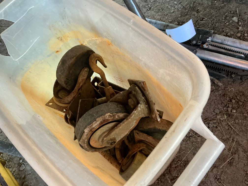 Plastic Tub Containing Caster Wheels, Turn Bucklet, Gate Hinges and More