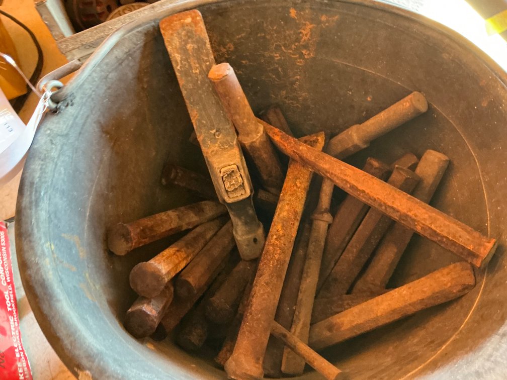 Bucket Of Approximately (22) Chisels And Hammer Bits