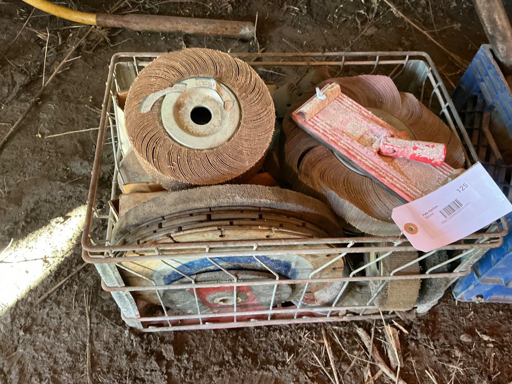 Wire Crate Containing - (3) Assorted Flap Wheels, (7) Assorted Wire Wheels - One Is 5", The Rest Are 8", (6) Assorted Grinding Wheels - 4", 8", 10", 12", (8) Assorted 12" Circular Saw Blades, (1) 7" Saw Blade, And More
