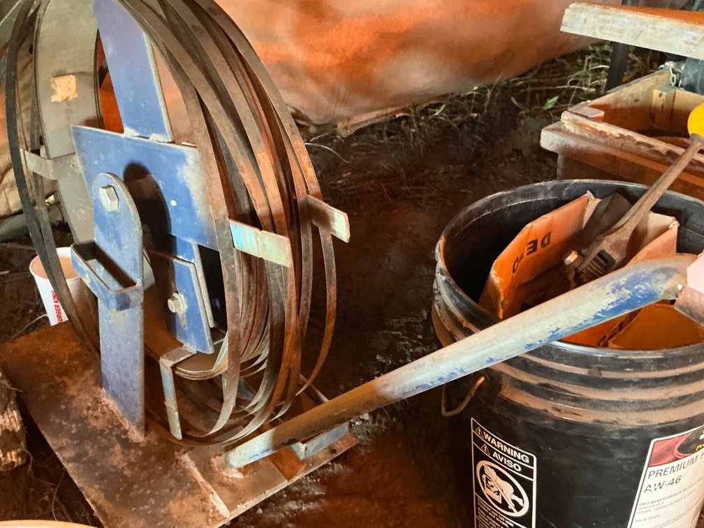 Metal Banding Strapping Cart With Partial Roll Of Banding, Acme Steel ManualTensioner Tool and 2/3 Full Bucket Of Metal Banding Clips