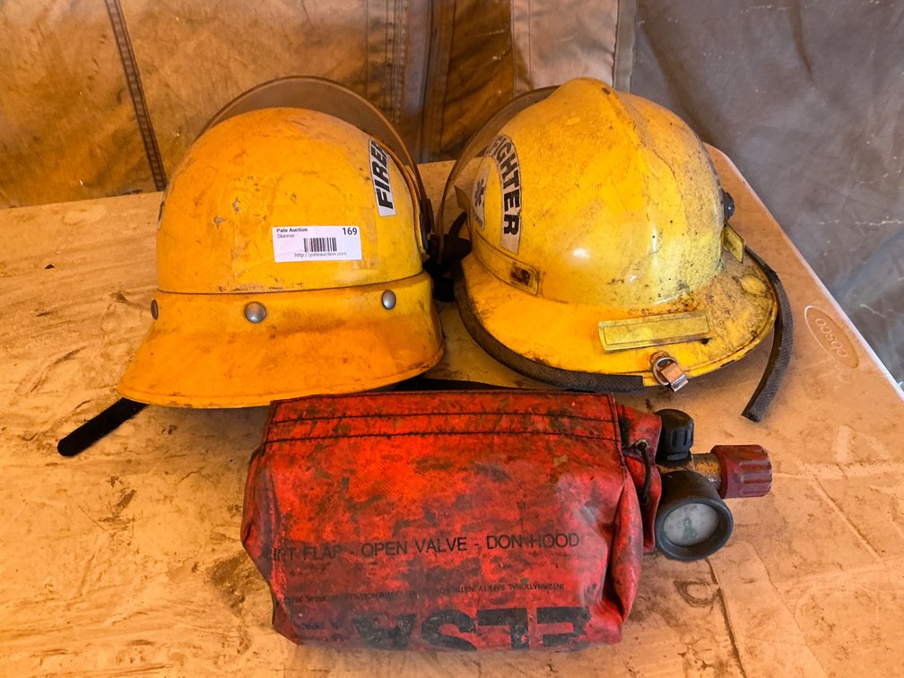 (1) Firefighter Helmet - Model: FH2 Series A3 Size C, (1) Cairns & Bros Fire Fighter Helmet - Model: 660X Yel Size: AD3, And (1) ELSA O2 Tank With Hood