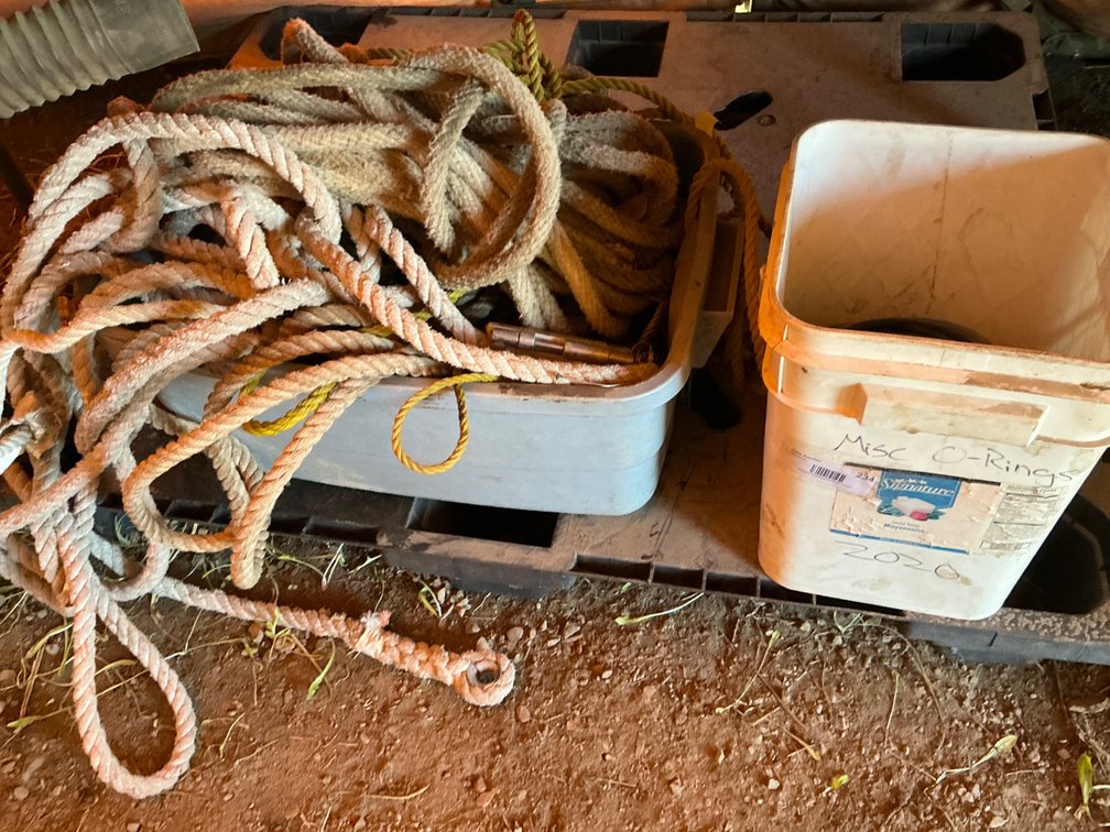 Partial Bucket Of O-Rings (Less Than 1/2 Full) Appear To Be 4" To 6" Sizes Roughly, And Tub Of Assorted Rope Sections - Some Have Lifeline Clamps