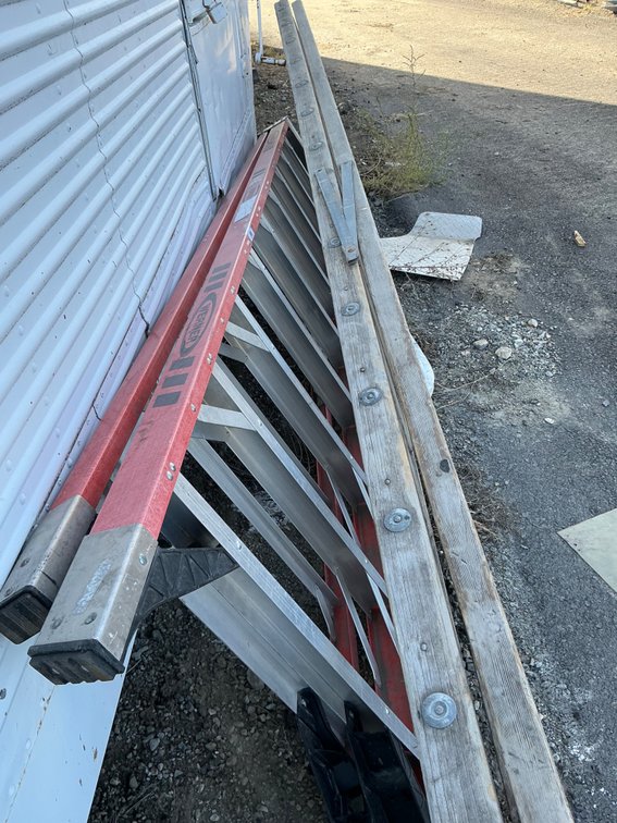 (1) Werner 12' Fiberglass Step Ladder, And (1) 14' Wooden Step Ladder