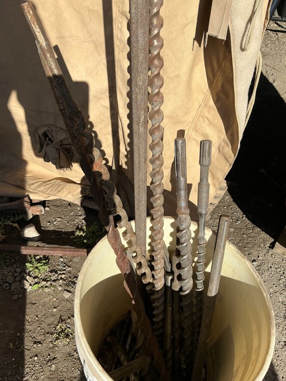 Bucket Containing Assorted Hammer Drill Bits - Various Sizes & Lengths