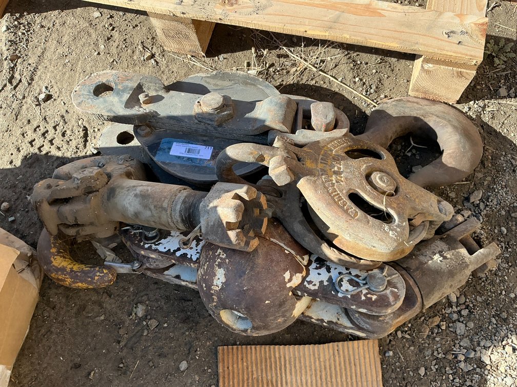(1) Universal Swiveling Lifting Hook, (1) Large Block With Lifting Hook, (1) Washington Iron Works Lifting Block, And (1) Pintle Hitch Receiver