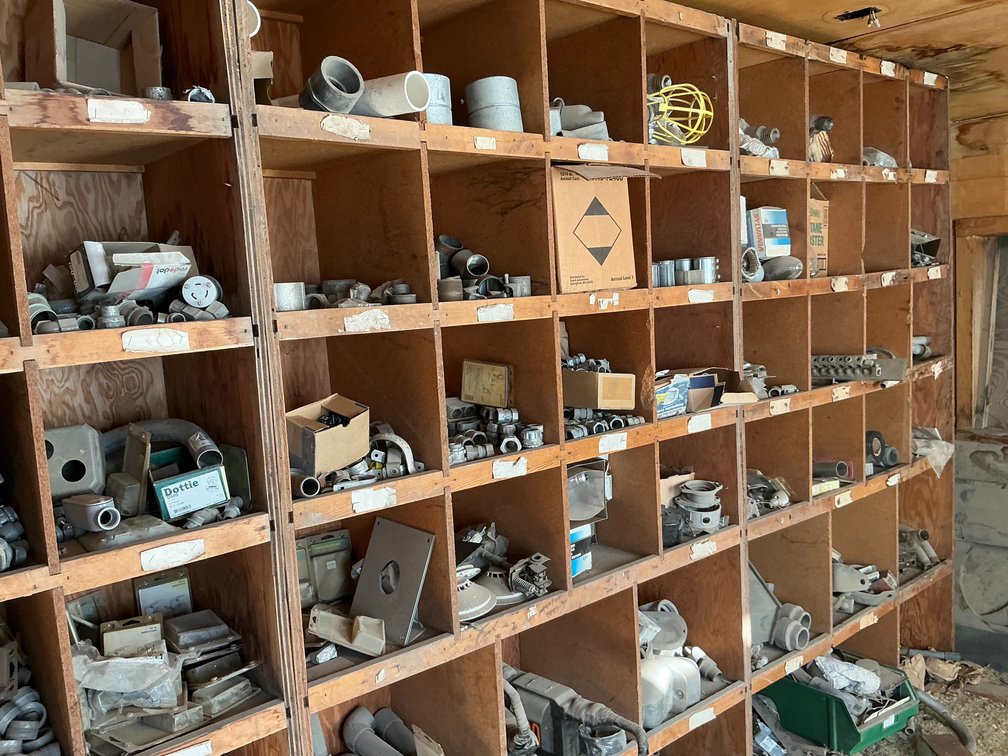 Contents Within Mobile Home - Wall Shelves Containing Electrical Boxes, Conduit Fittings, Outlet Boxes, Breakers, Light Bulbs, Thermostats, Wiring, Breaker Boxes, Flex Conduit & More