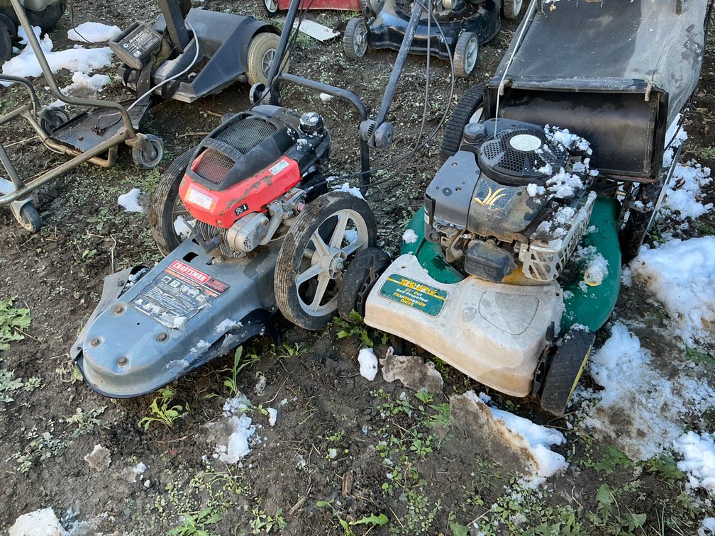 Yardman 21" Cut Self Propelled Transmission Drive Push Mower, Rope Start Pulls Free - But Hard, And Craftsman 5.5Hp, 22" Push Weed Trimmer (Rope Start Pulled All The Way Out)