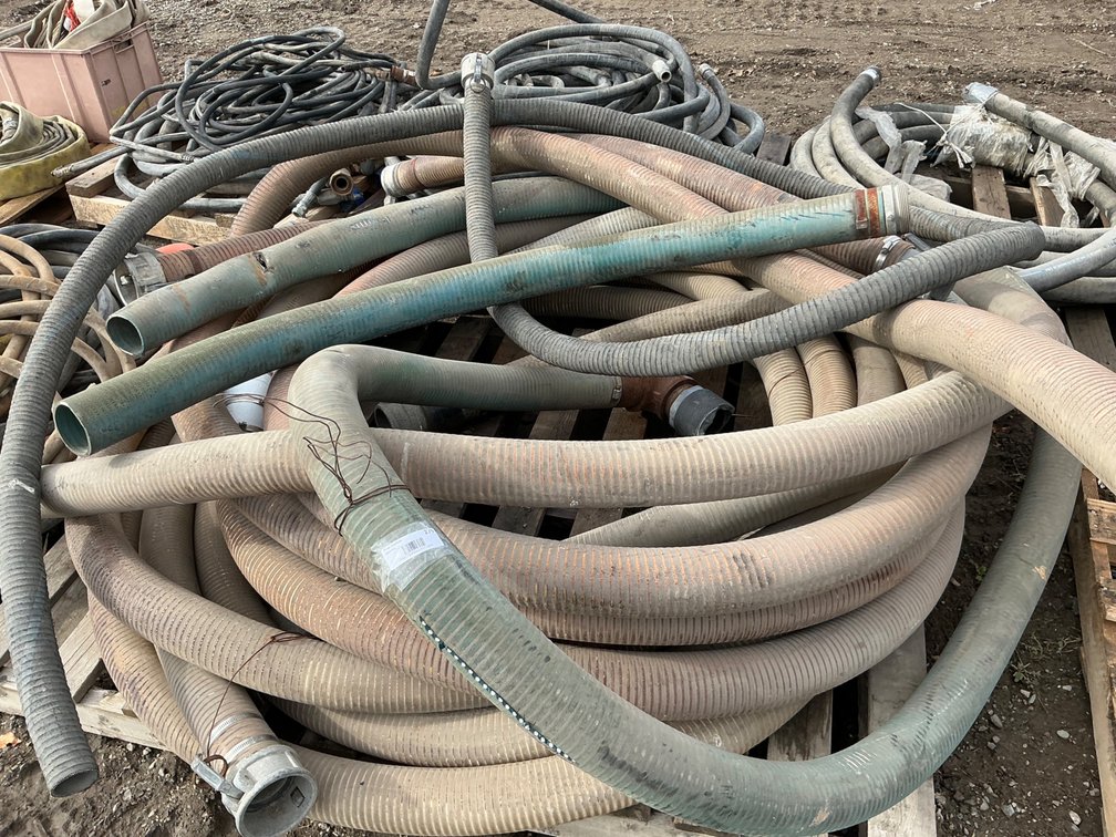 Pallet Of Assorted Flexible PVC Suction & Discharge Hoses - Mainly 3", (1) 2", At Least (7) Camlock Couplers (One Hose Has Hole That Can Be Seen)