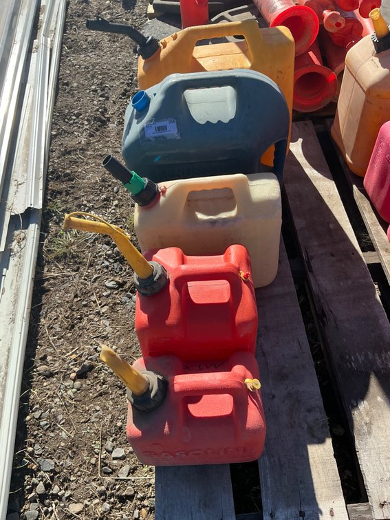 (5) Poly Gas Cans - (1) Is 1-Gallon, (2) Are 2.5-Gallon, (1) 5-Gallon Kerosene, (1) 5-Gallon Diesel