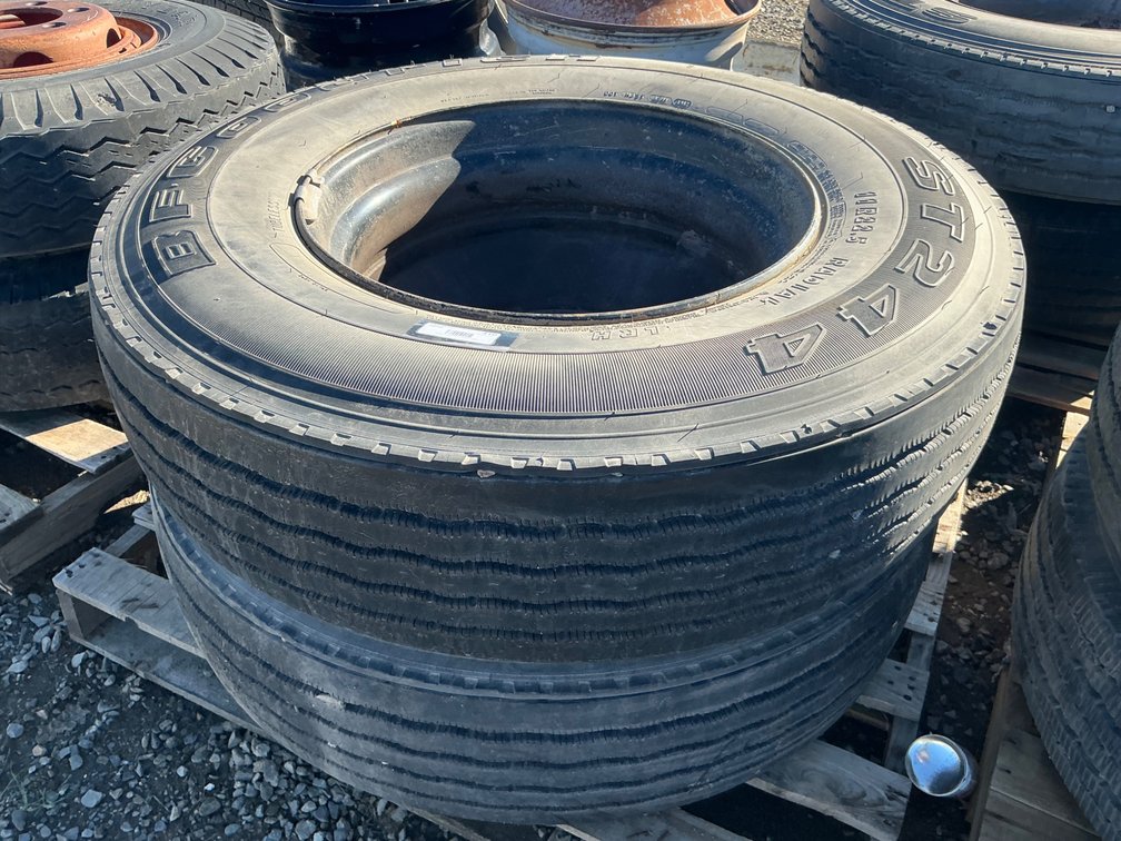(2) 11R22.5 Tires On 10-Lug Steel Wheels - Fair Tread