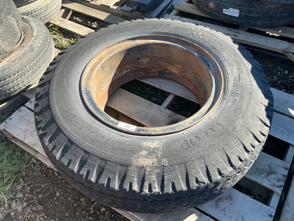 (1) 9.00-20 Tire On Steel Wheel (Weathered)
