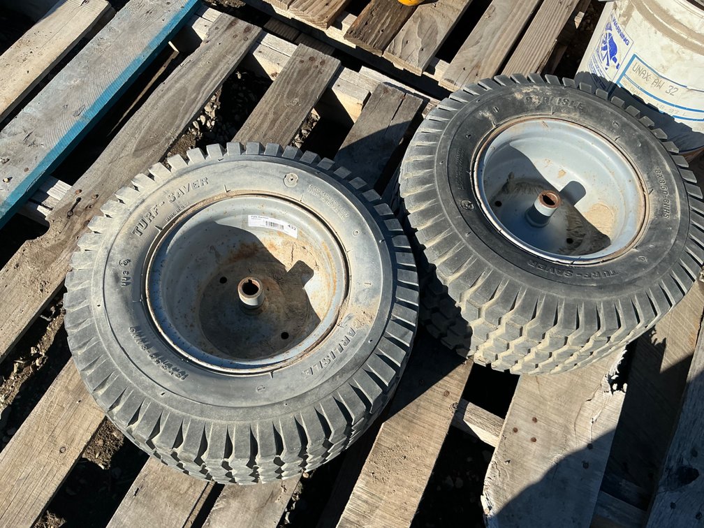 (2) 18x8.50-8NHS Tires On Steel Wheels - Fair Tread