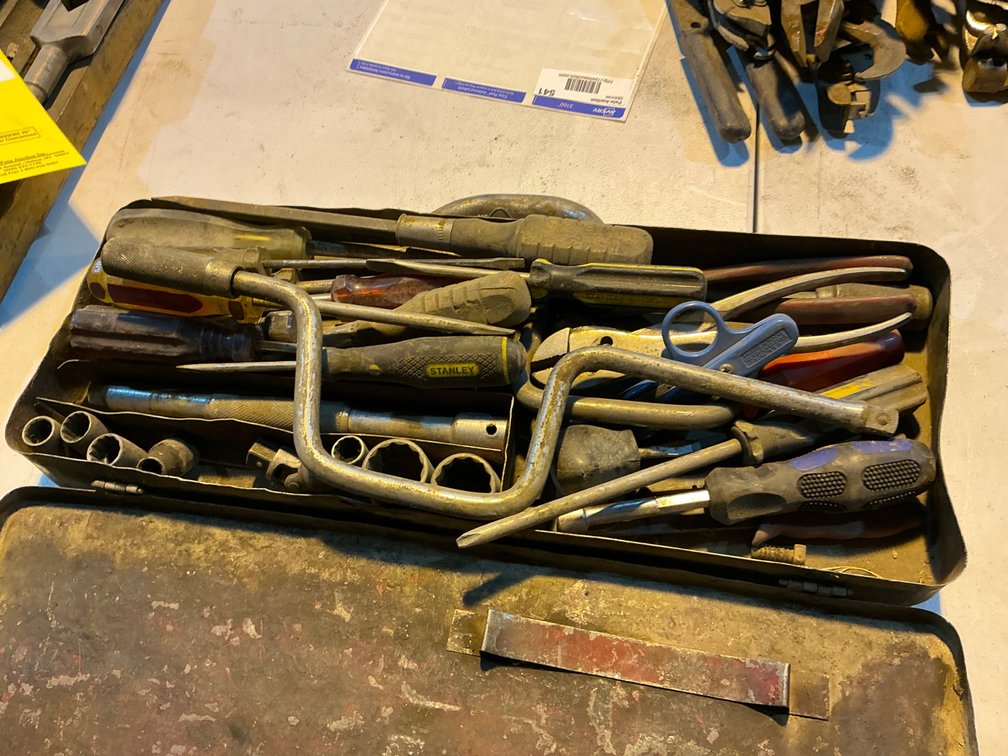 Metal Flat Toolbox Of Assorted Tools - Screwdrivers, Pliers, Sockets, Electrical Pliers & More
