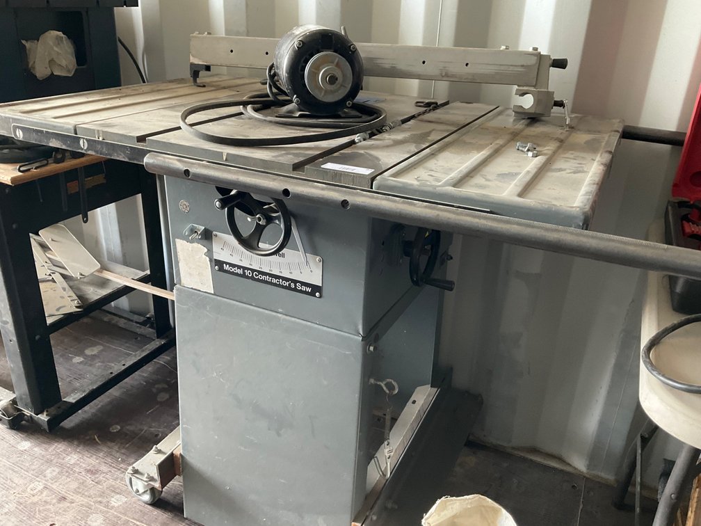 Rockwell Contractors Table Saw - Model: 10 on Stand With Rollers (Motor Included But Not Installed)