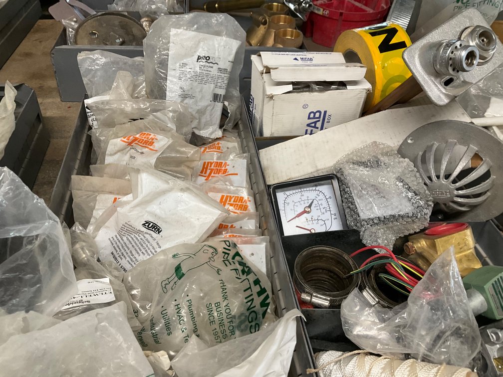 (2) Metal Bins with Assorted 1/2" Pex Fittings, Strut Clamps, Hose Bib, Rubber Couplings, Flanges, Hydrant Box, Gauges, Etc.