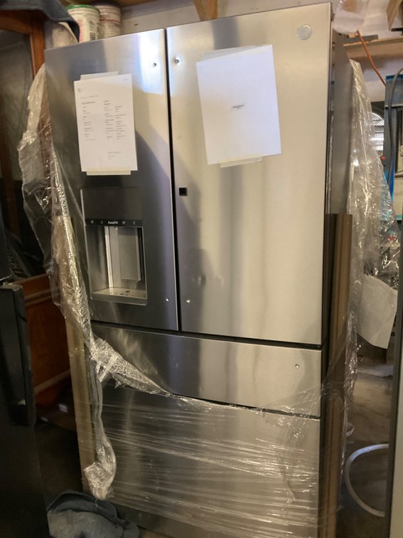 GE Refrigerator - Model: PVD28BYNFS, 27.9 Cubic Foot, Stainless, Double Door, Bottom Freezer, Unused, 36"W x 70"H x 34"D